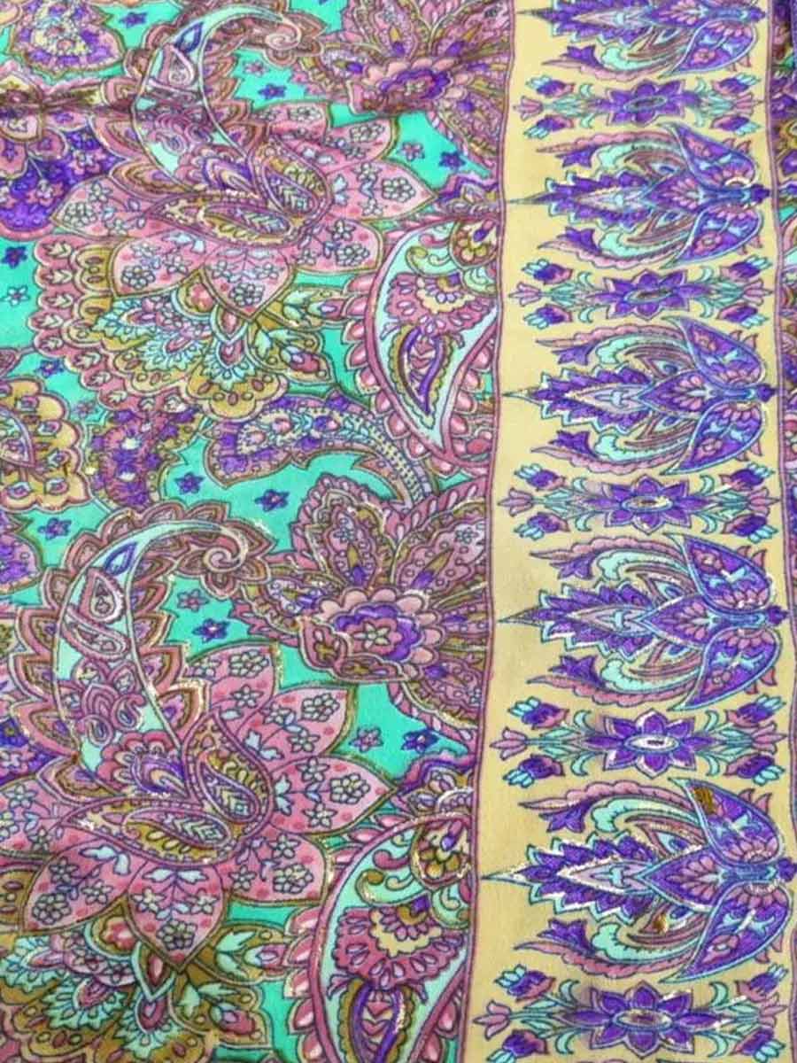 Colorful paisley pattern on a fabric background