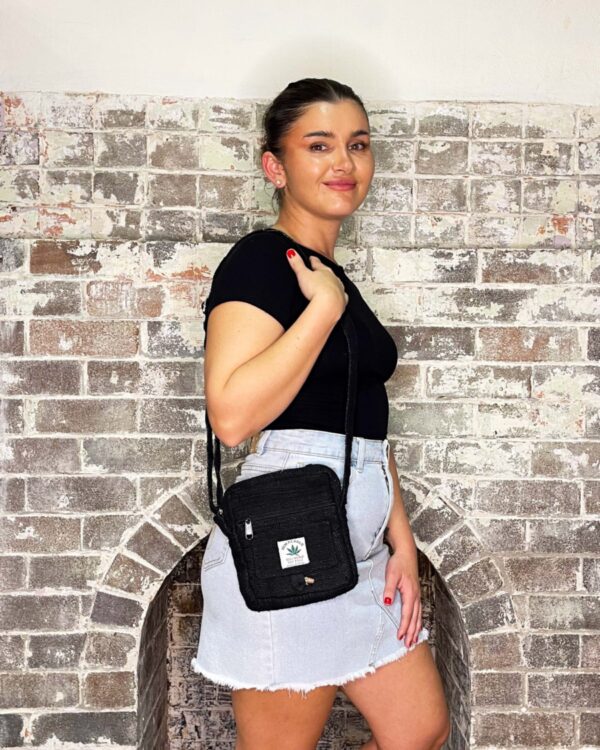 black hemp passport bag with shoulder strap