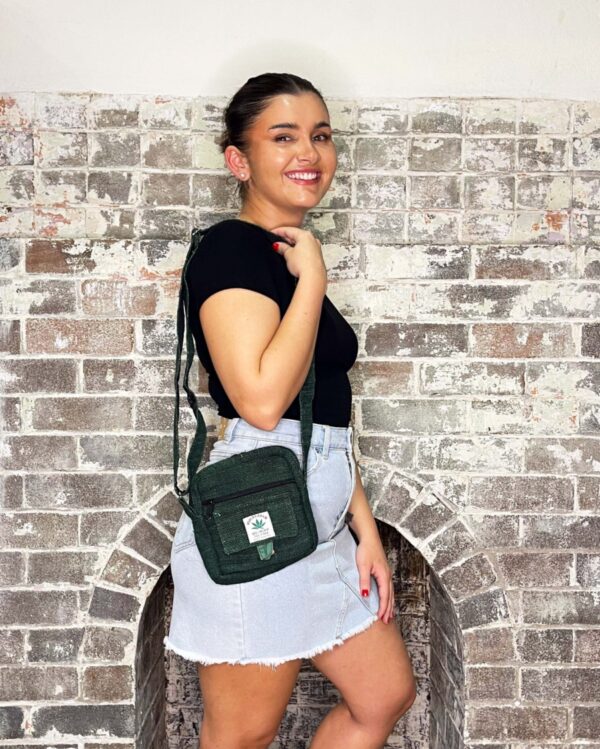 green hemp passport bag with shoulder strap