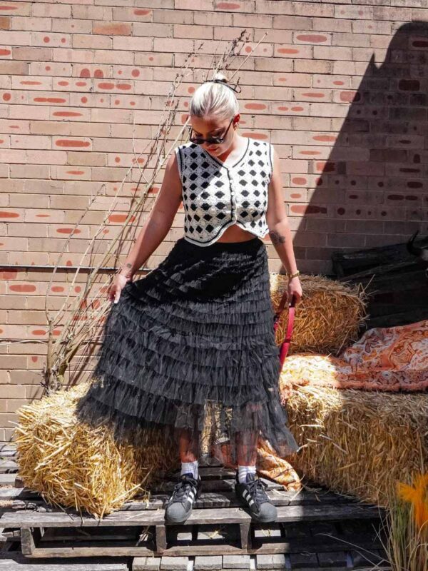 black tule skirt and crochet vest