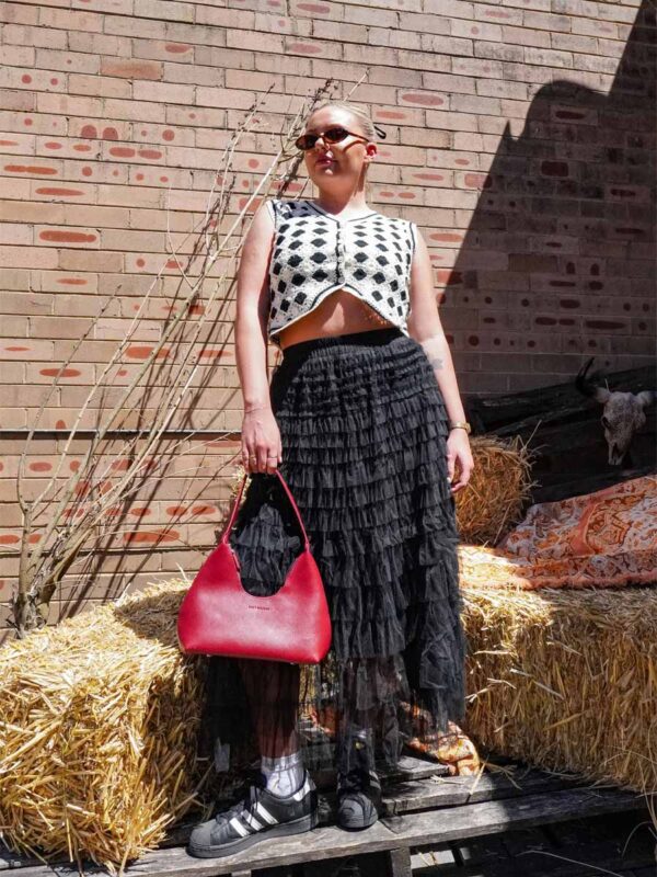 black tule skirt and crochet vest