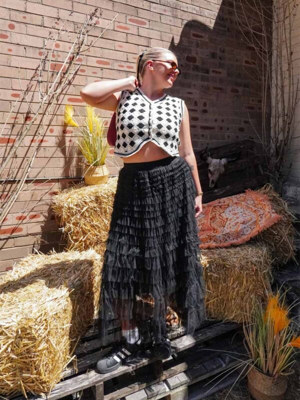 black tule skirt and crochet vest