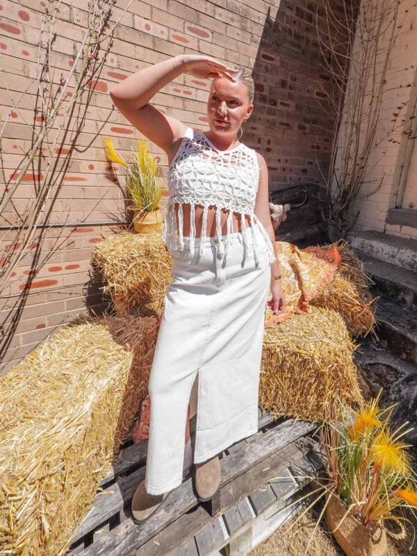 white denim maxi skirt and white crochet tassel top