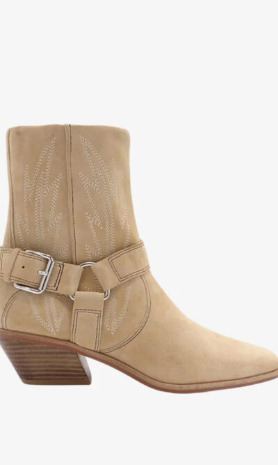 Light tan, suede, western-style, cowboy boots with white embroidered accents and low heels.