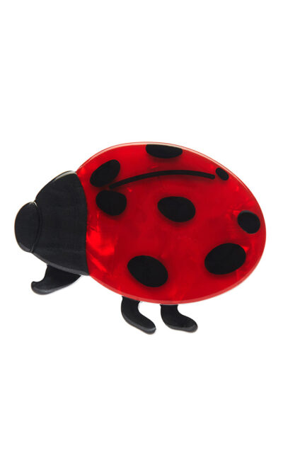 A woman's brooch depicting a red lady beetle.