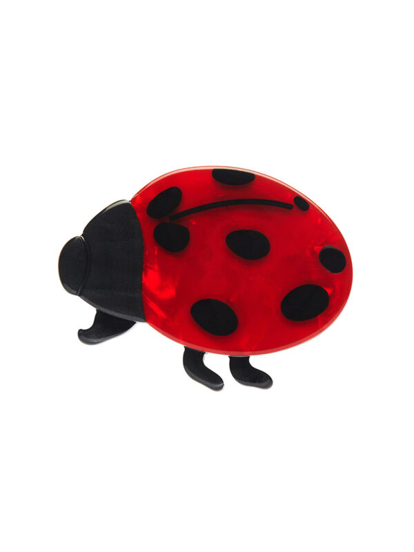 A woman's brooch depicting a red lady beetle.