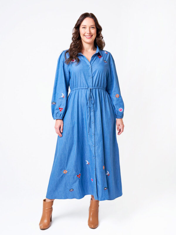 woman wearing a blue denim maxi dress