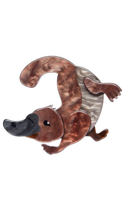 A woman's brooch depicts a swimming platypus.