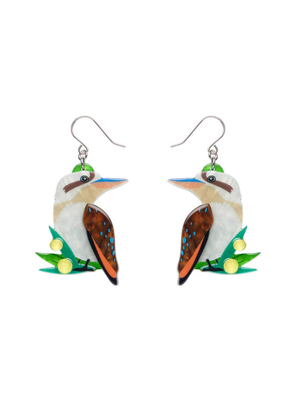 Woman's earrings depicting kookaburras on a branch.